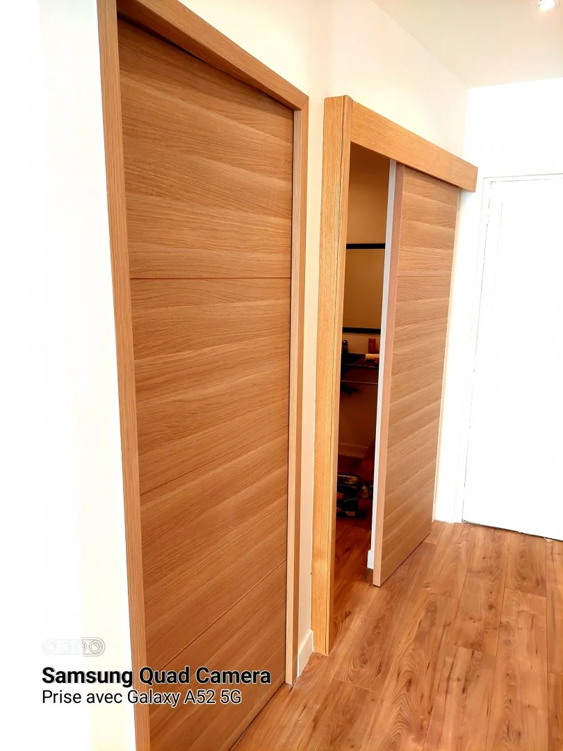 Pose de parquet et de portes coulissantes en bois